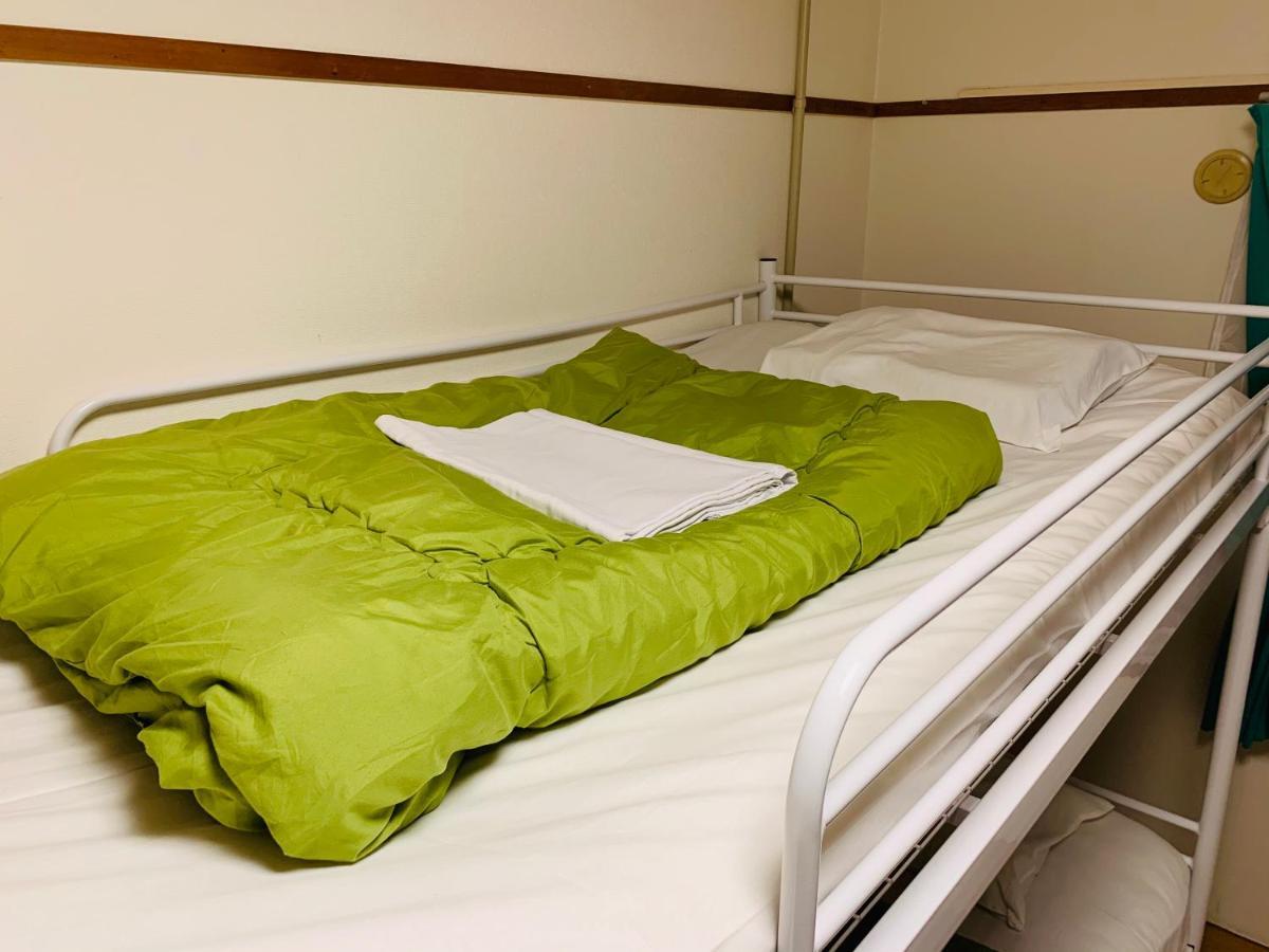 Guesthouse Shiawase Eki Фукуока Экстерьер фото